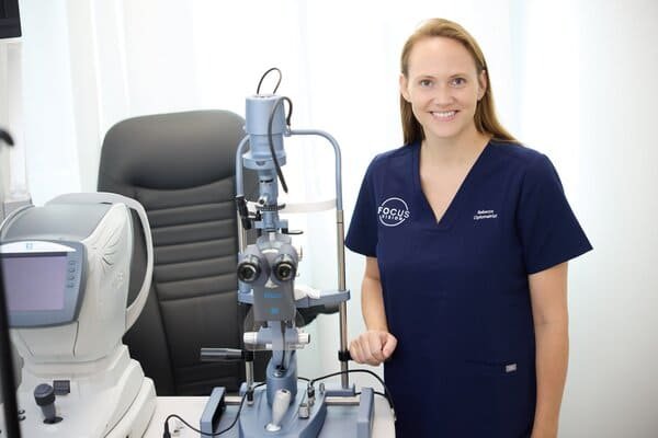 Focus Vision staff member with diagnostic equipment